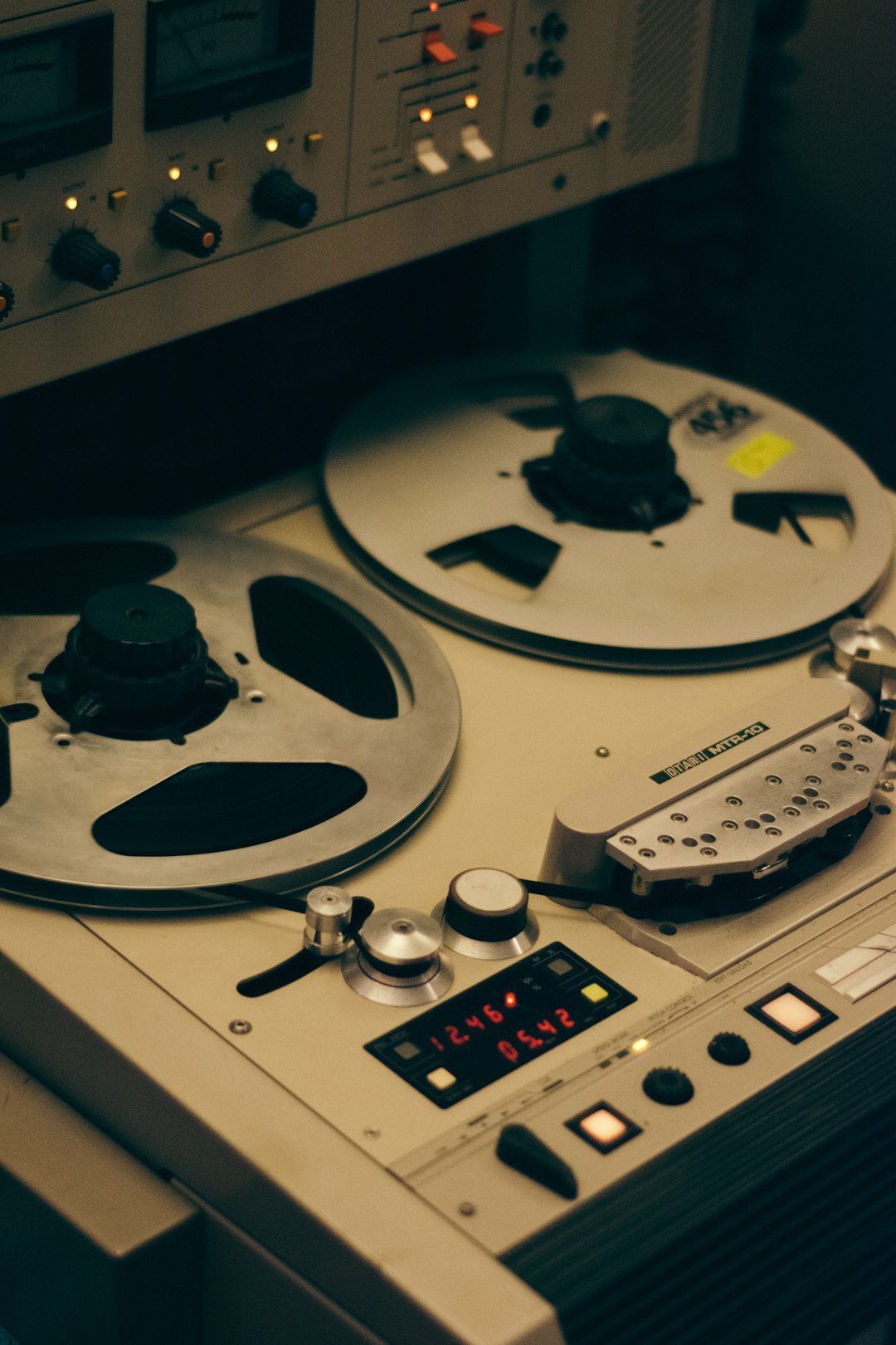 Vintage analogue video editing suite with tape decks and CRT monitors