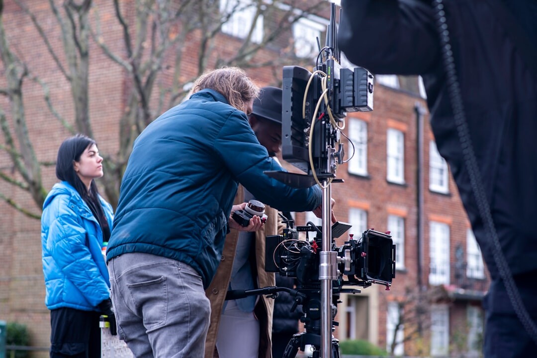 Film crew setting up cameras and lights for a television commercial shoot